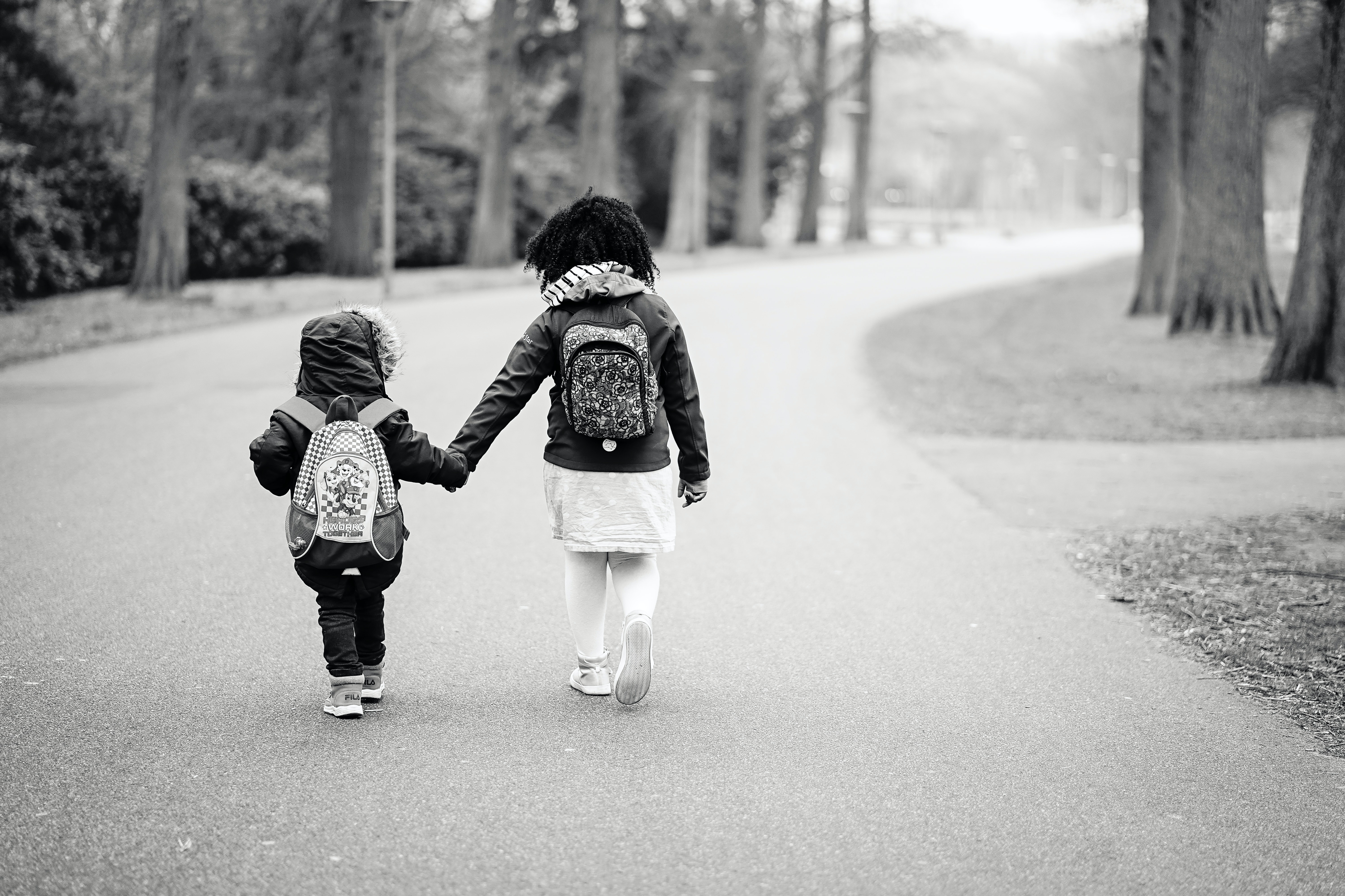 kids1 two kids walking and holding hands