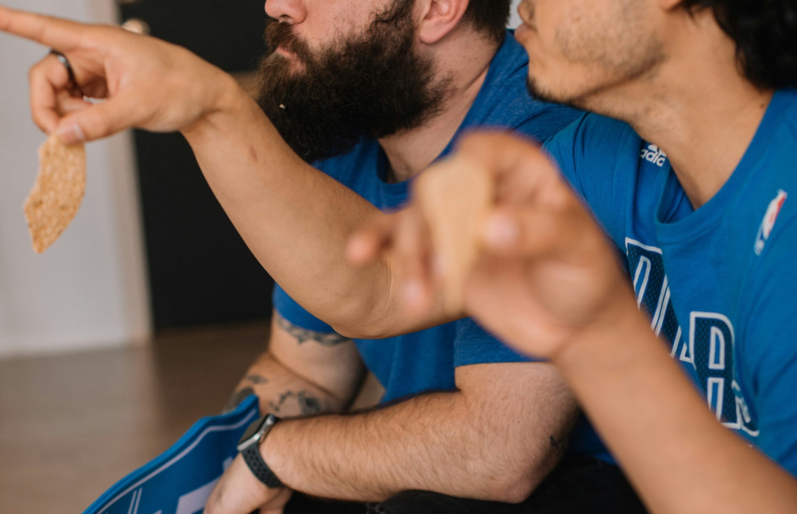 man9 guys watching sports