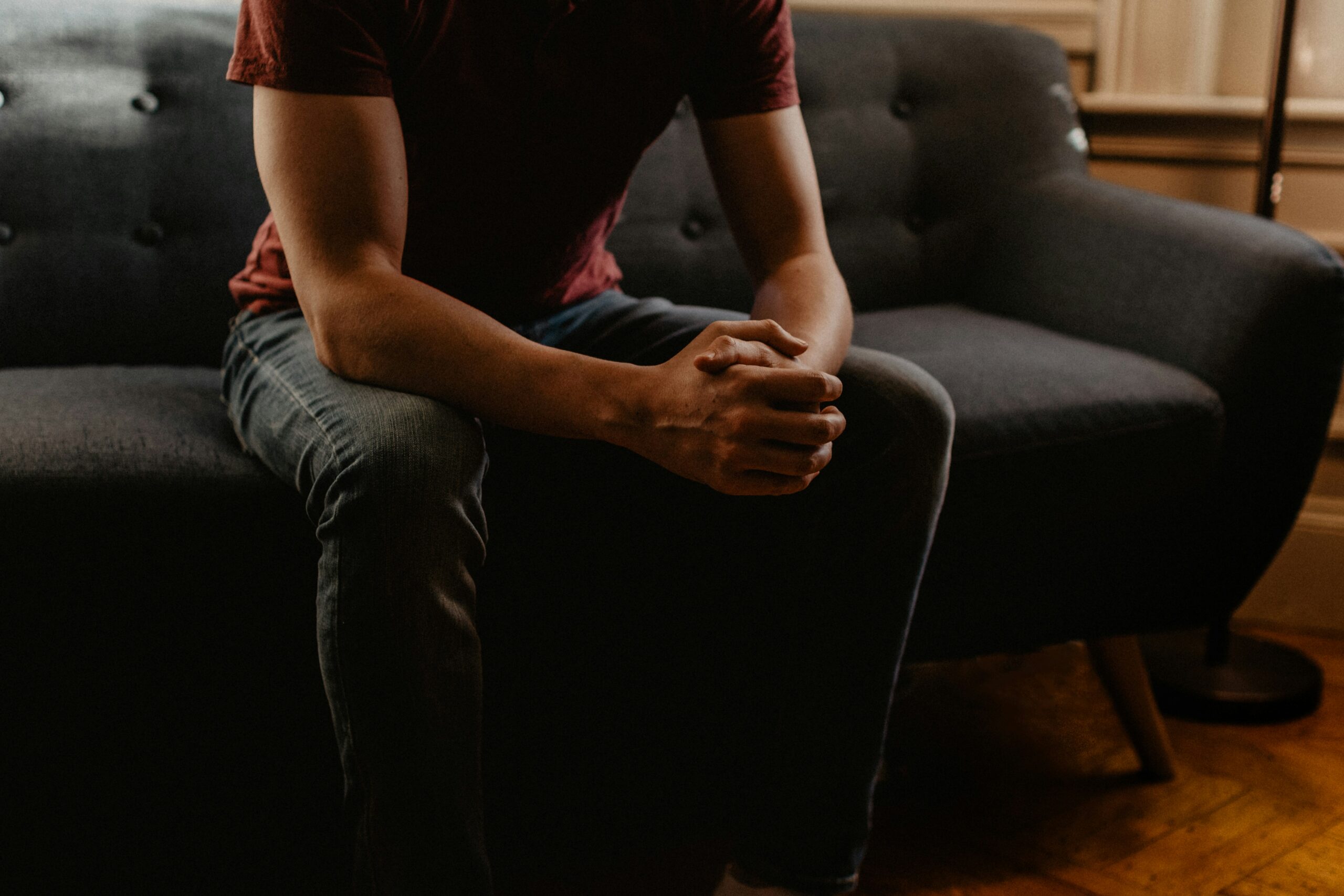 man sitting on a couch